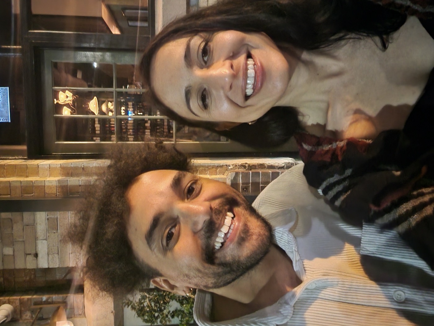 Clifton and Vanessa taking a selfie outside at night